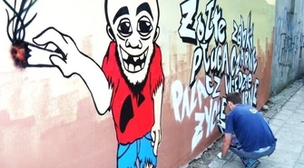 Palacz już na murze – grafficiarska akcja studentów