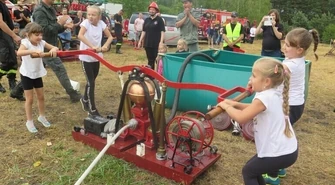 XI Powiatowe Zawody Sikawek Konnych i Przenośnych w strugach deszczu